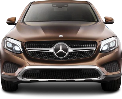 Front view of a sleek bronze Mercedes-Benz GLC, featuring a prominent grille and iconic star logo, exuding luxury and style.
